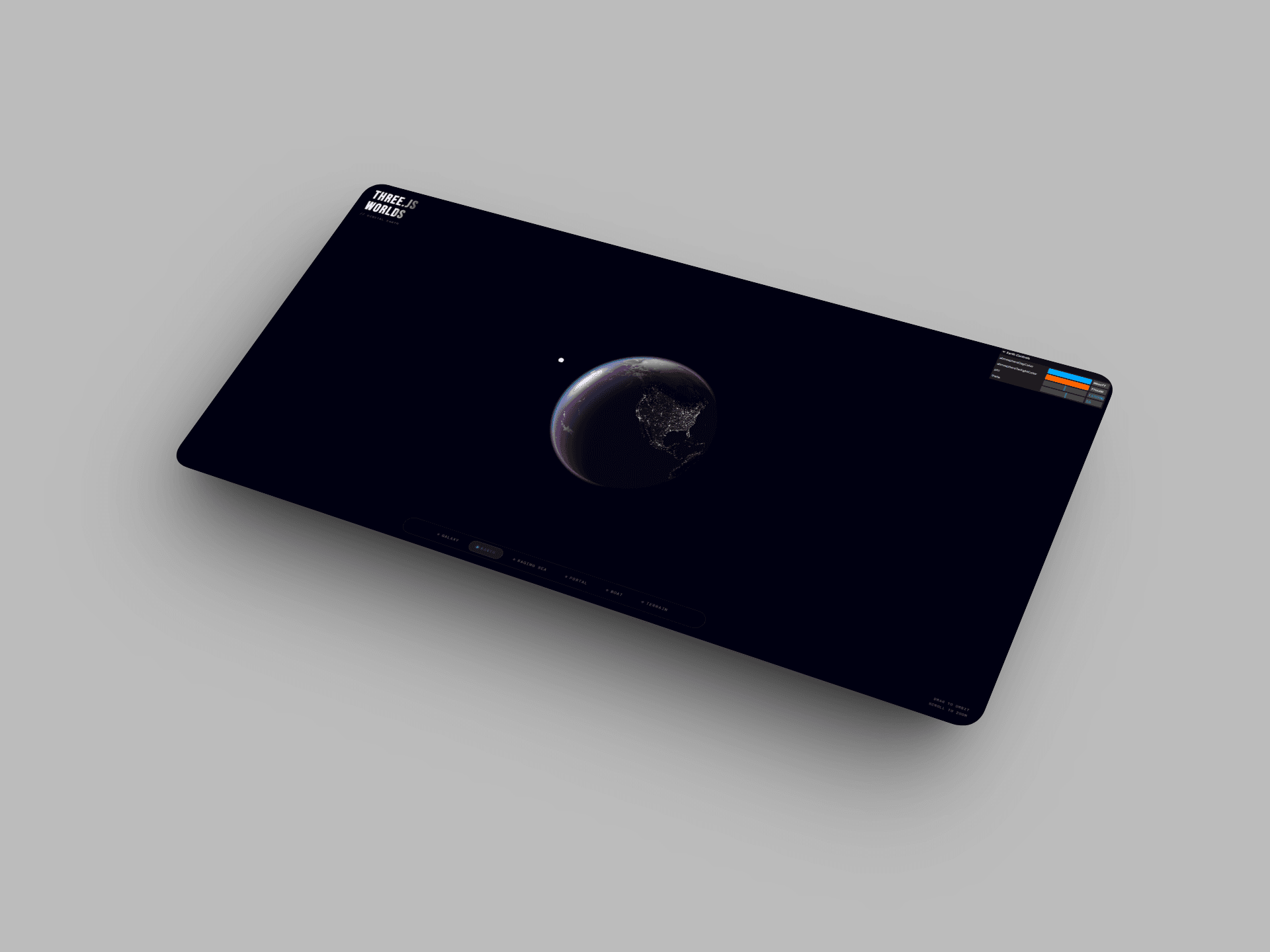 Three JS Worlds project shown on a laptop mockup with a particle boat scene.